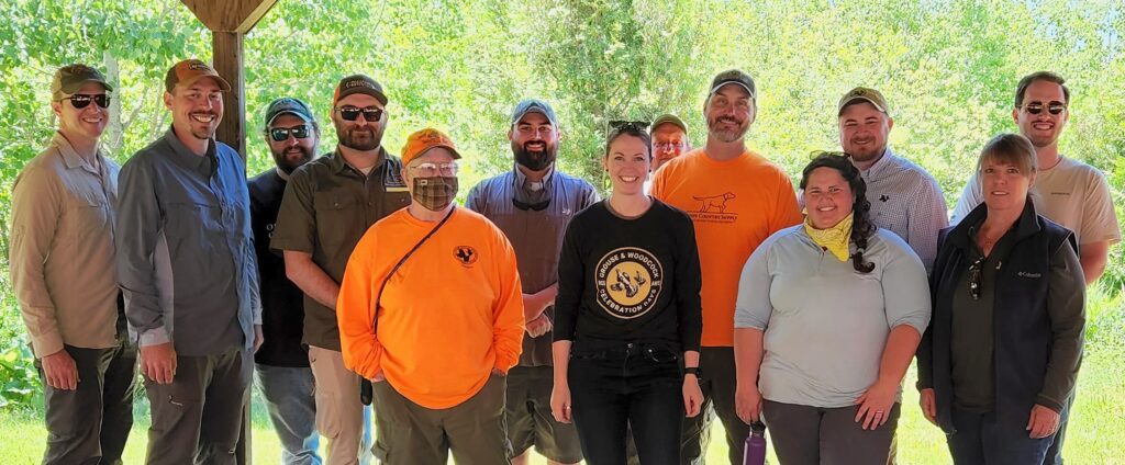 staff and volunteers smiling at camera during a chapter event